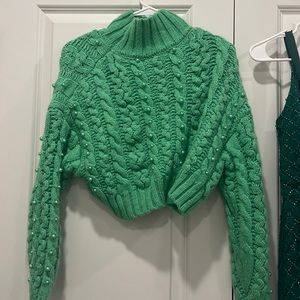 Green Zara cropped sweater with pearls.